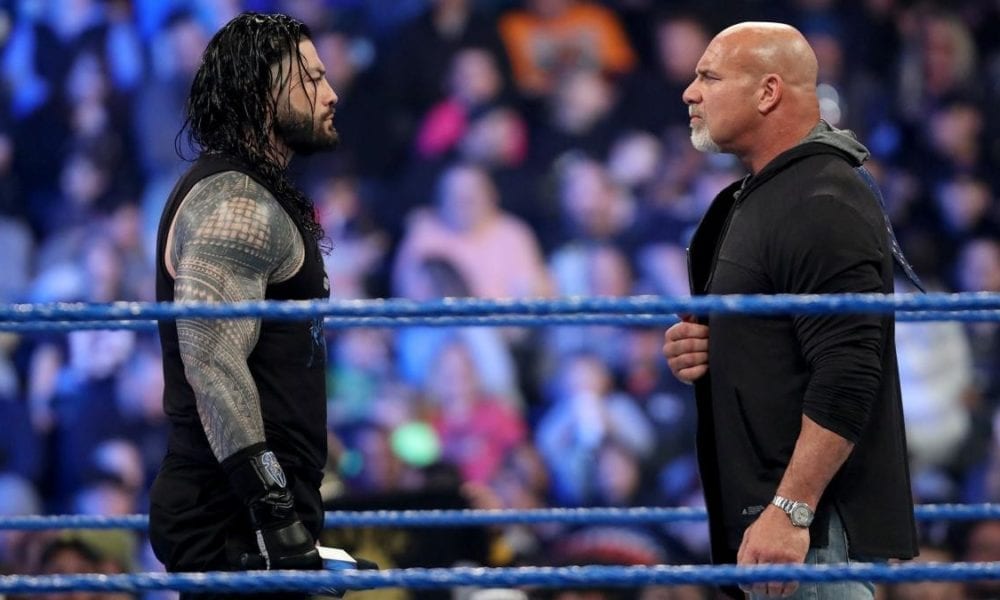 Roman Reigns reacts after being called out by Goldberg